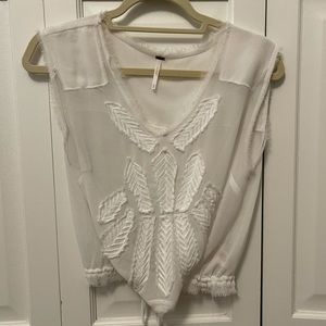 White tie across sheer top